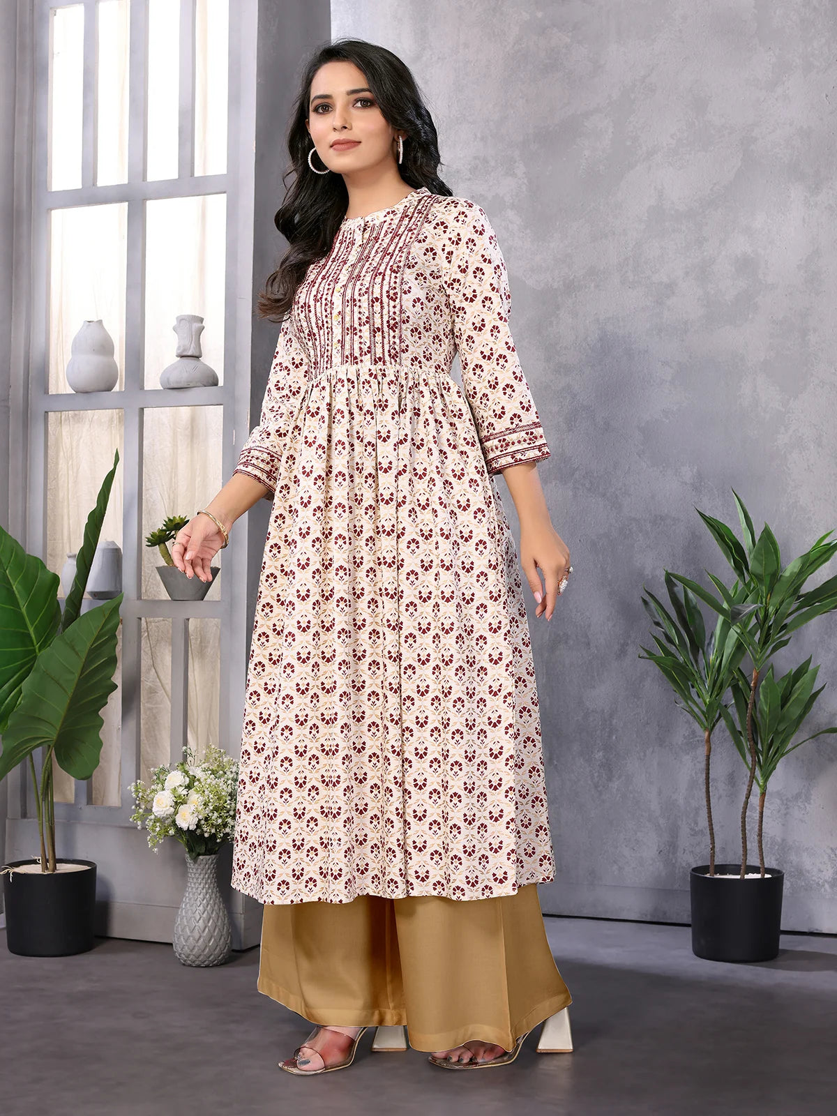 Buy రేయాన్ ఎంబ్రాయిడరీ కాఫ్ లెంగ్త్ ఫ్లేర్డ్ కుర్తా-ఆఫ్ వైట్