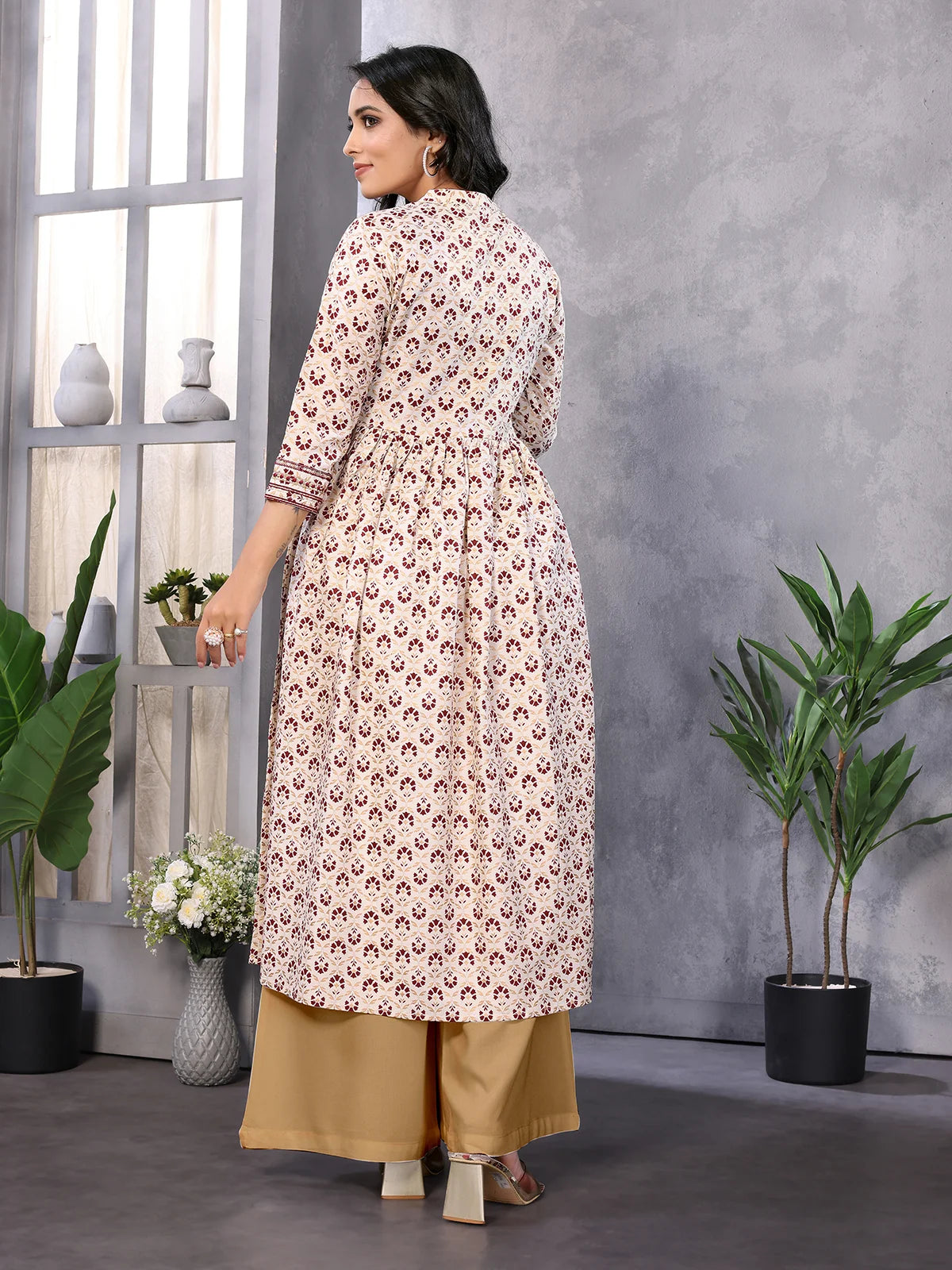 Buy రేయాన్ ఎంబ్రాయిడరీ కాఫ్ లెంగ్త్ ఫ్లేర్డ్ కుర్తా-ఆఫ్ వైట్